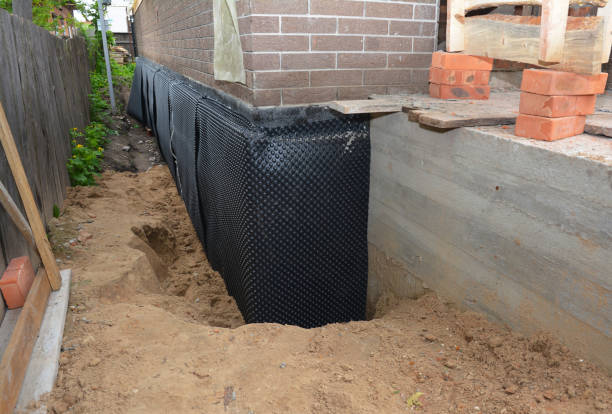 Happy homeowners after waterproofing job in Fort Wayne